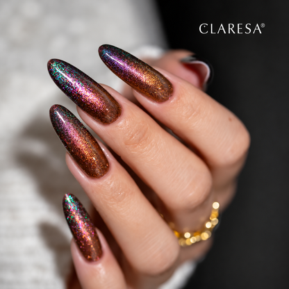 Claresa Ilusion Gold ημιμόνιμο βερνίκι νυχιών 5g σε πολυδιάστατη χάλκινη-χρυσή glitter απόχρωση με ιριδίζουσες αντανακλάσεις